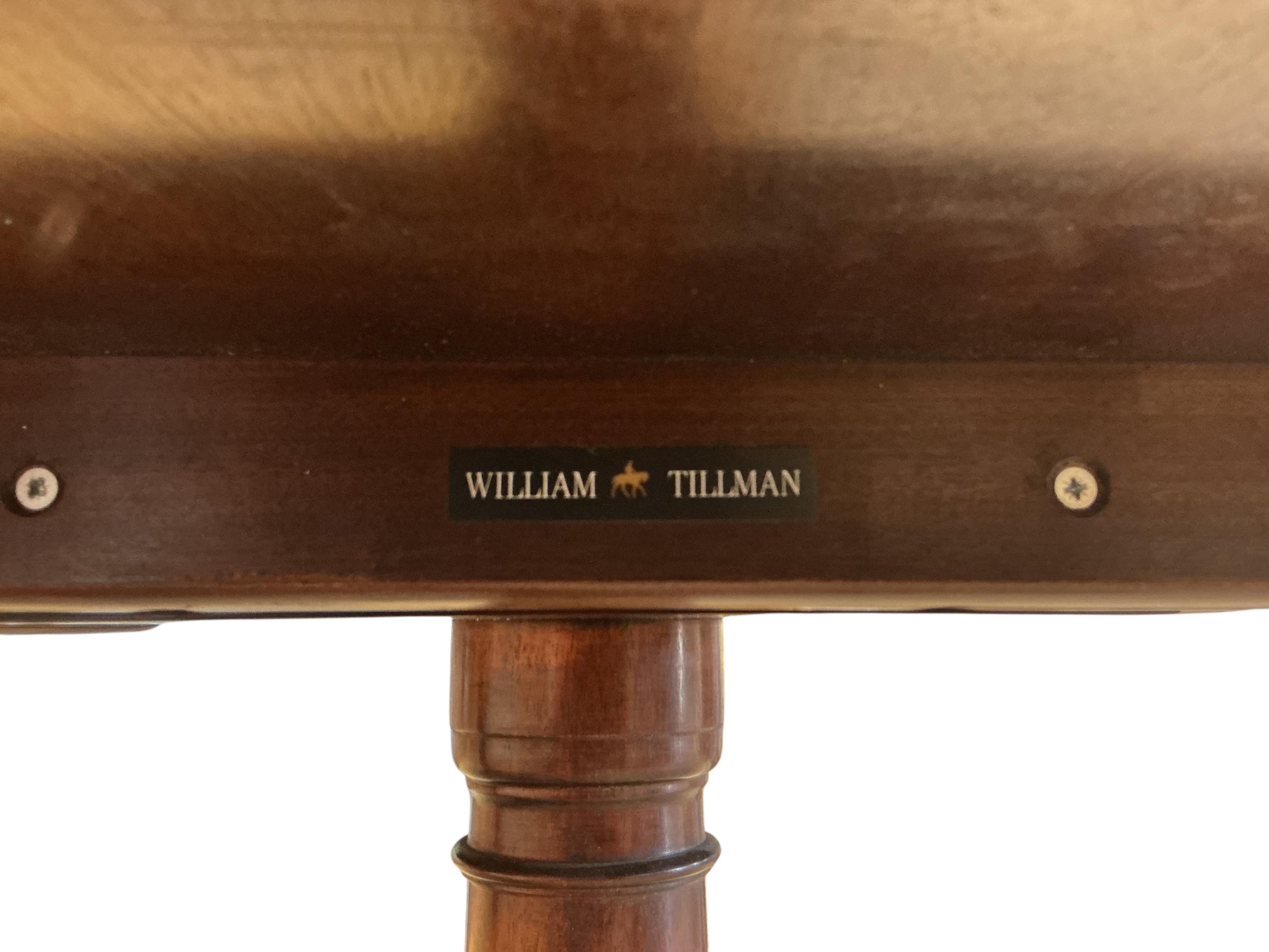 A William Tillman reproduction mahogany twin pillar extending dining table, 225cm extended, one spare leaf, depth 115cm, height 74cm
